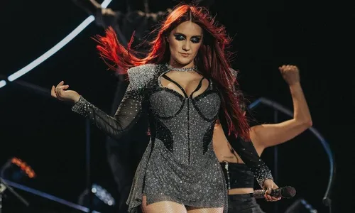 
          Imagem ilustrativa da imagem Dulce Maria diz que está doente em meio a shows do RBD no Brasil
          