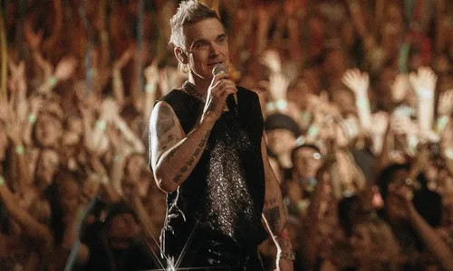 
          Imagem ilustrativa da imagem Robbie Williams homenageia fã que morreu em seu show na Austrália
          