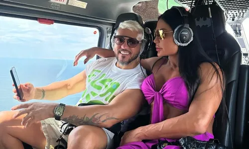 
          Imagem ilustrativa da imagem Belo e Gracyanne Barbosa levam marmitas para cruzeiro de Neymar
          