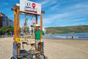 Imagem ilustrativa da imagem Criatividade para faturar renda extra com fotos de turistas em praia de Guarapari