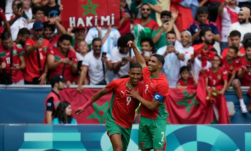 Imagem ilustrativa da imagem Partida é retomada após interrupção de 1h30 e Marrocos vence Argentina na Olimpíada