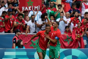 Imagem ilustrativa da imagem Partida é retomada após interrupção de 1h30 e Marrocos vence Argentina na Olimpíada