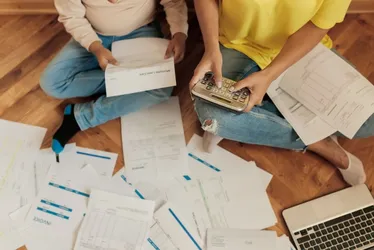 Imagem ilustrativa da imagem Serasa dá auxílio-dívida de R$ 100 para quitar dívida
