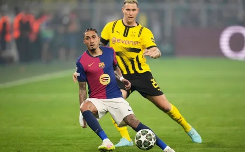 
          Imagem ilustrativa da imagem Barcelona toma susto, mas segura pressão do Dortmund e vai à semifinal da Champions
          
