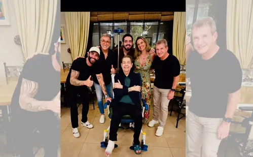 
          Imagem ilustrativa da imagem Faustão aparece de pé enfaixado em foto ao lado de Gusttavo Lima e família
          