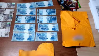 Imagem ilustrativa da imagem Vigilante é preso com R$ 2 mil em notas falsas na cidade de Timbaúba