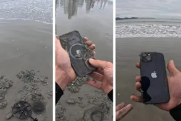 Imagem ilustrativa da imagem Vídeo: jovem com detector de metais acha Iphone soterrado em Balneário Camboriú e devolve à dona