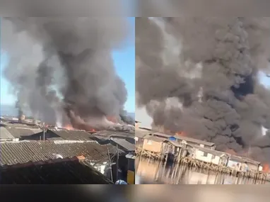 Imagem ilustrativa da imagem Incêndio de grandes proporções atinge favela de palafitas em Santos