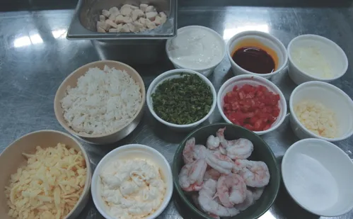 
          Imagem ilustrativa da imagem Camarão Capixaba: arroz cremoso que une moqueca e banana
          