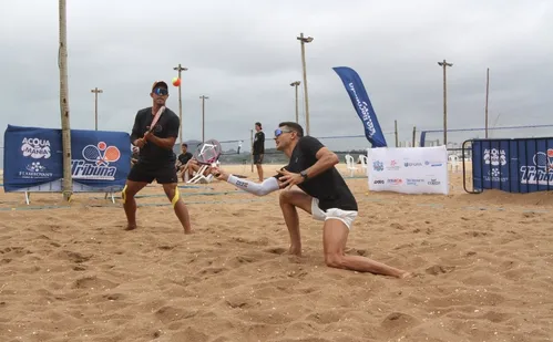 
          Imagem ilustrativa da imagem Tribuna Open de Beach Tennis: feras em ação nas areias de Camburi
          