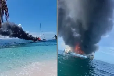 
          Imagem ilustrativa da imagem Brasileiros saltam em mar com tubarões após barco no Panamá pegar fogo
          