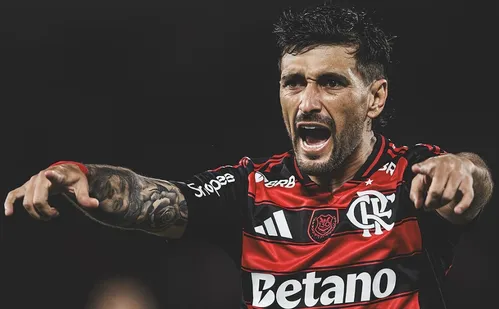 
          Imagem ilustrativa da imagem Arrascaeta é escolhido como craque do Prêmio Brasileirão 2025
          