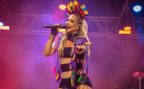 
          Imagem ilustrativa da imagem Latino faz a festa na praia de Camburi
          