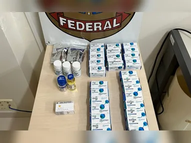 Arma e dinheiro apreendido na abordagem da PRF