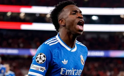 
          Imagem ilustrativa da imagem Em jogo marcado por racismo, Real Madrid bate Benfica com golaço de Vini Jr
          