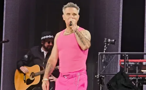
          Imagem ilustrativa da imagem Robbie Williams anuncia show único em SP no Allianz Parque para outubro
          