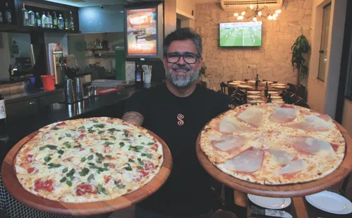 
          Imagem ilustrativa da imagem Dia da Pizza: confira promoções e sabores especiais em pizzarias do ES
          