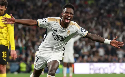
          Imagem ilustrativa da imagem Vini Jr. acerta renovação com o Real Madrid até 2032
          
