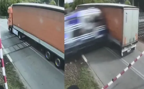 
          Imagem ilustrativa da imagem Vídeo mostra caminhão atingido por trem após ficar preso em trilhos
          