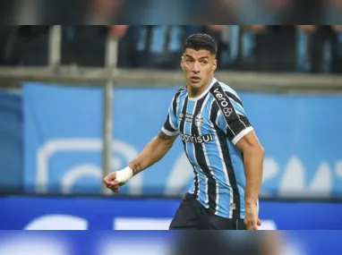 Imagem ilustrativa da imagem Suárez está disposto a devolver R$ 48 mi ao Grêmio para jogar nos EUA