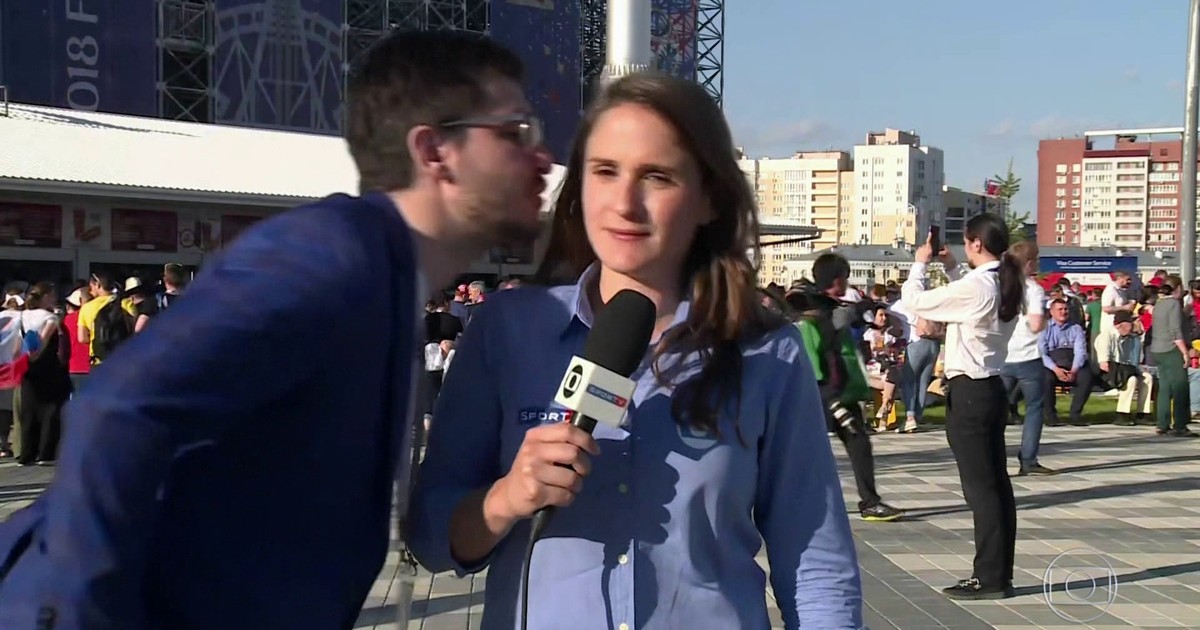 Repórter repreendeu torcedor que tentou beijá-la. (Foto: Reprodução/ Rede Globo)