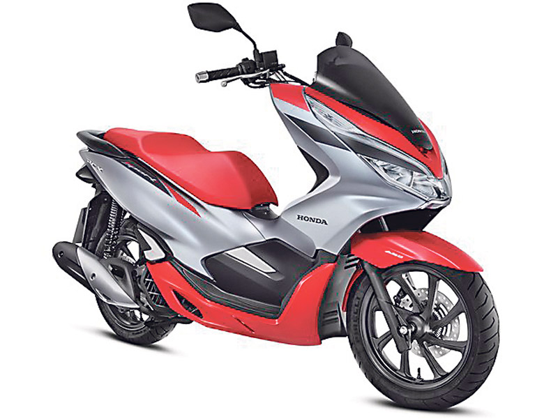 O design do PCX, scooter mais vendido do Brasil, ficou mais moderno. Modelo traz conjunto ótico em LED e painel de instrumentos digital (Foto: Assessoria Honda)