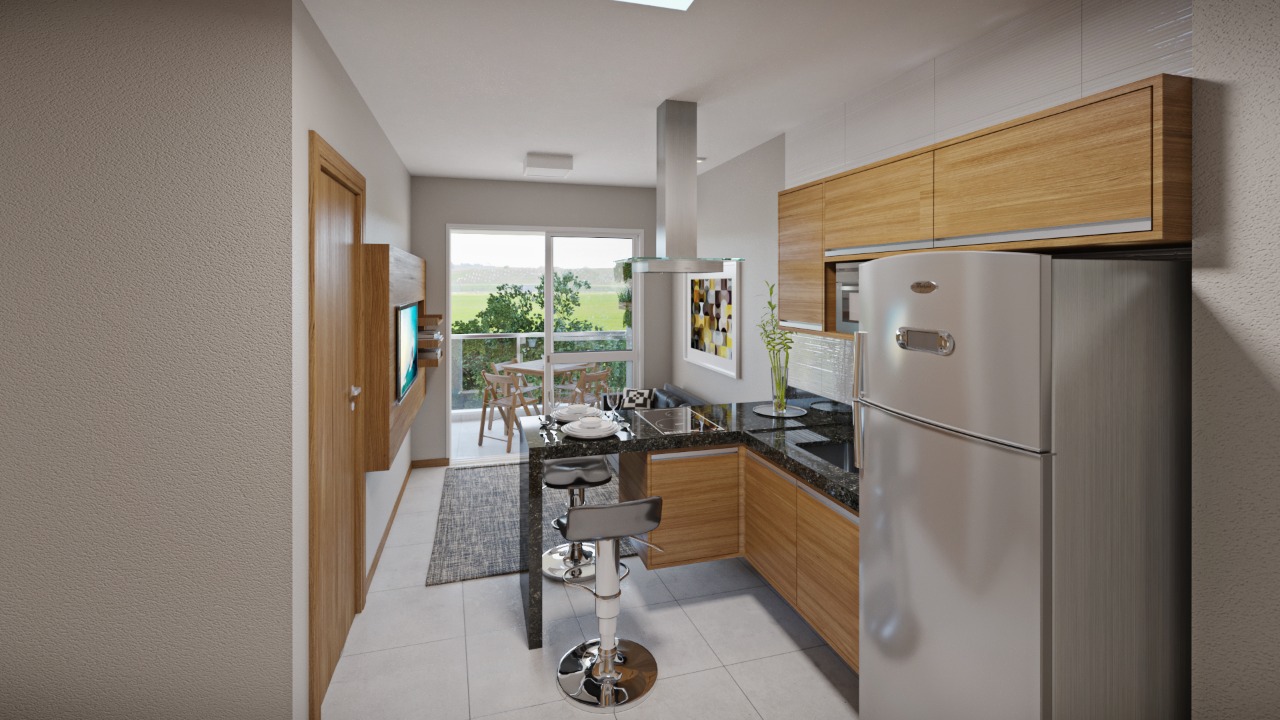 Cozinha do apartamento de 1 quarto do Facilità Camburi: entregue mobiliado e decorado (Foto: Divulgação)