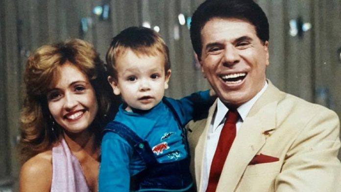 Marisa Teixeira ao lado de Sílvio Santos e uma criança (Foto: Divulgação)