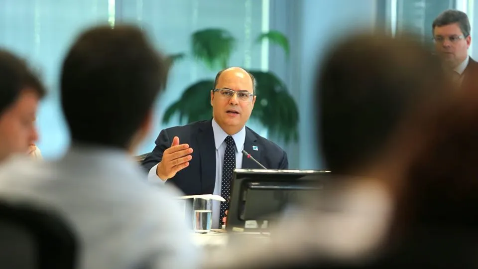 Imagem ilustrativa da imagem Witzel compara Bolsonaro ao 'maluco lá da Venezuela' e critica Guedes