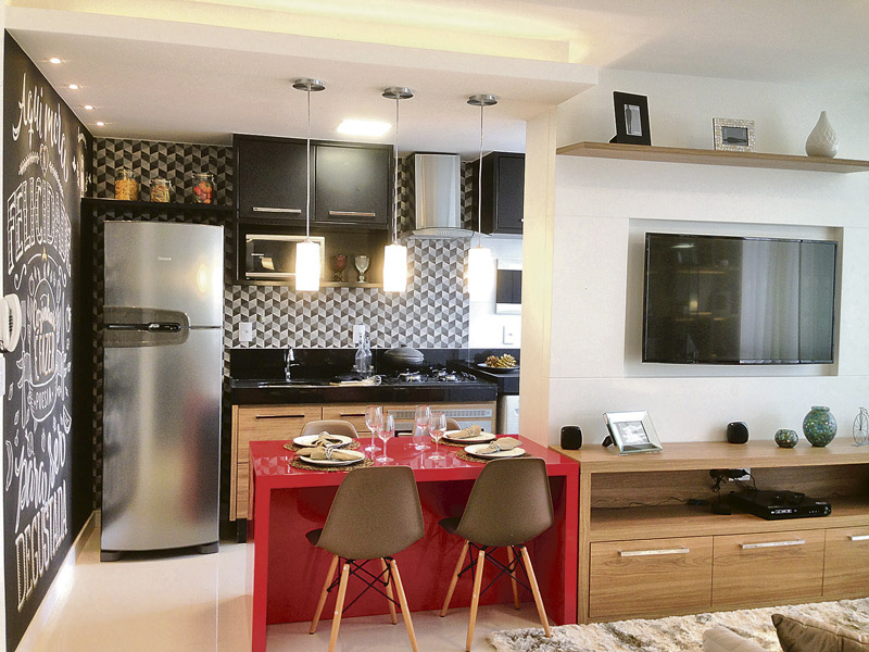 Sala e cozinha do address, na Praia do Canto: desconto de R$ 200 mil (Foto: Divulgação / Proeng)