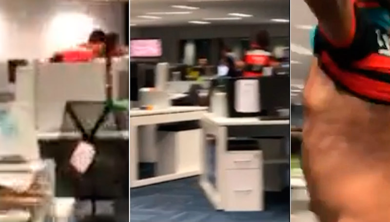 Vídeo mostrou jornalistas correndo e tirando a camisa dentro da redação (Foto: Reprodução / Portal UOL)