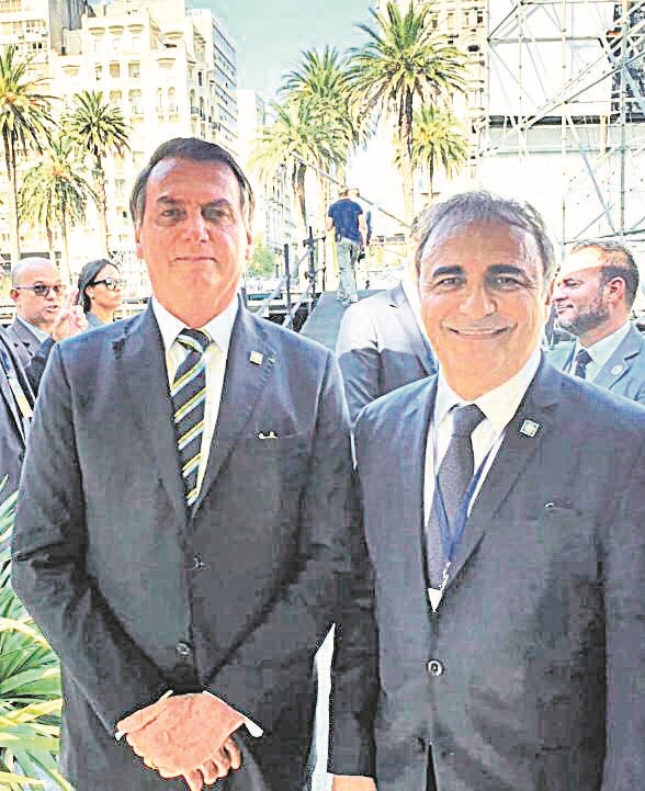 Bolsonaro e o senador Ricardo Merlo na foto publicada junto com o anúncio (Foto: Reprodução/ Facebook Ricardo Merlo)