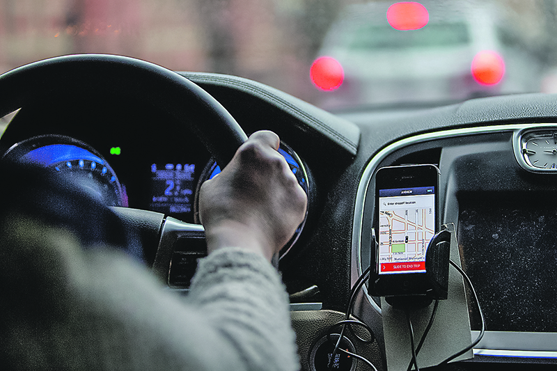 Motorista de aplicativo: duas formas de enquadrar a renda obtida, incluindo contribuição com o Carnê-Leão (Foto: Andrew Harrer/Bloomberg via Getty Images)