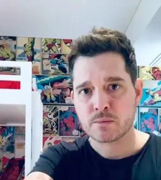 Imagem ilustrativa da imagem Recuperado de câncer, filho de 6 anos de Michael Bublé invade vídeo dos pais