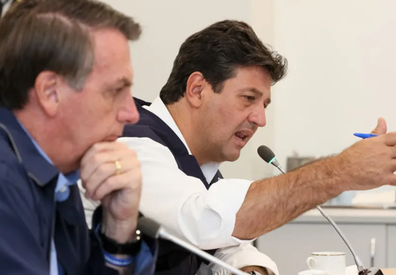 Mandetta e Bolsonaro, durante videoconferência com prefeitos
