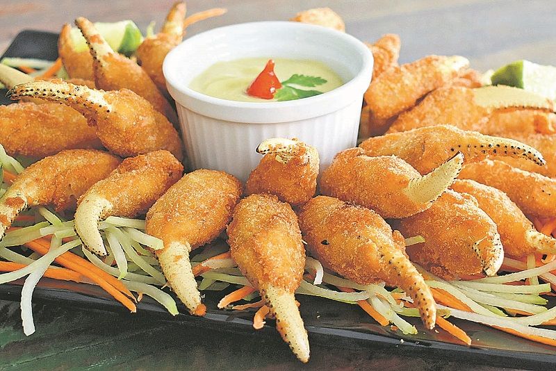 Puãs à milanesa do Caranguejo do Assis. (Foto: divulgação/ caranguejo do assis)