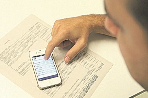 Pagamento de boleto pelo celular (Foto: Divulgação)