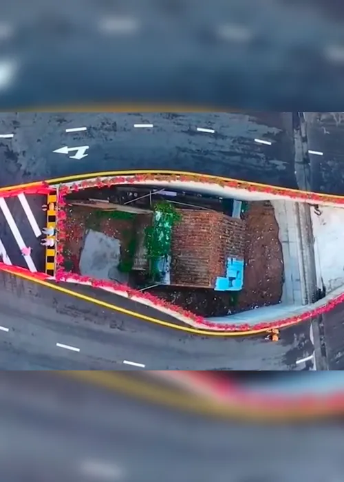 Imagem ilustrativa da imagem VÍDEO | Viaduto é construído em volta de casa de moradora que recusou se mudar