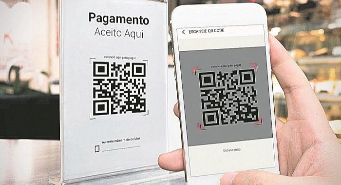 Cliente paga com leitor de código (Foto: Divulgação)