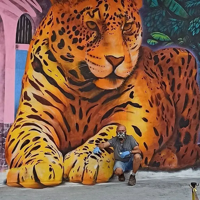 Imagem ilustrativa da imagem Pintura de onça gigante 3D transforma prédio no centro de Vitória