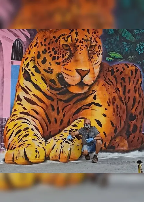 Imagem ilustrativa da imagem Pintura de onça gigante 3D transforma prédio no centro de Vitória