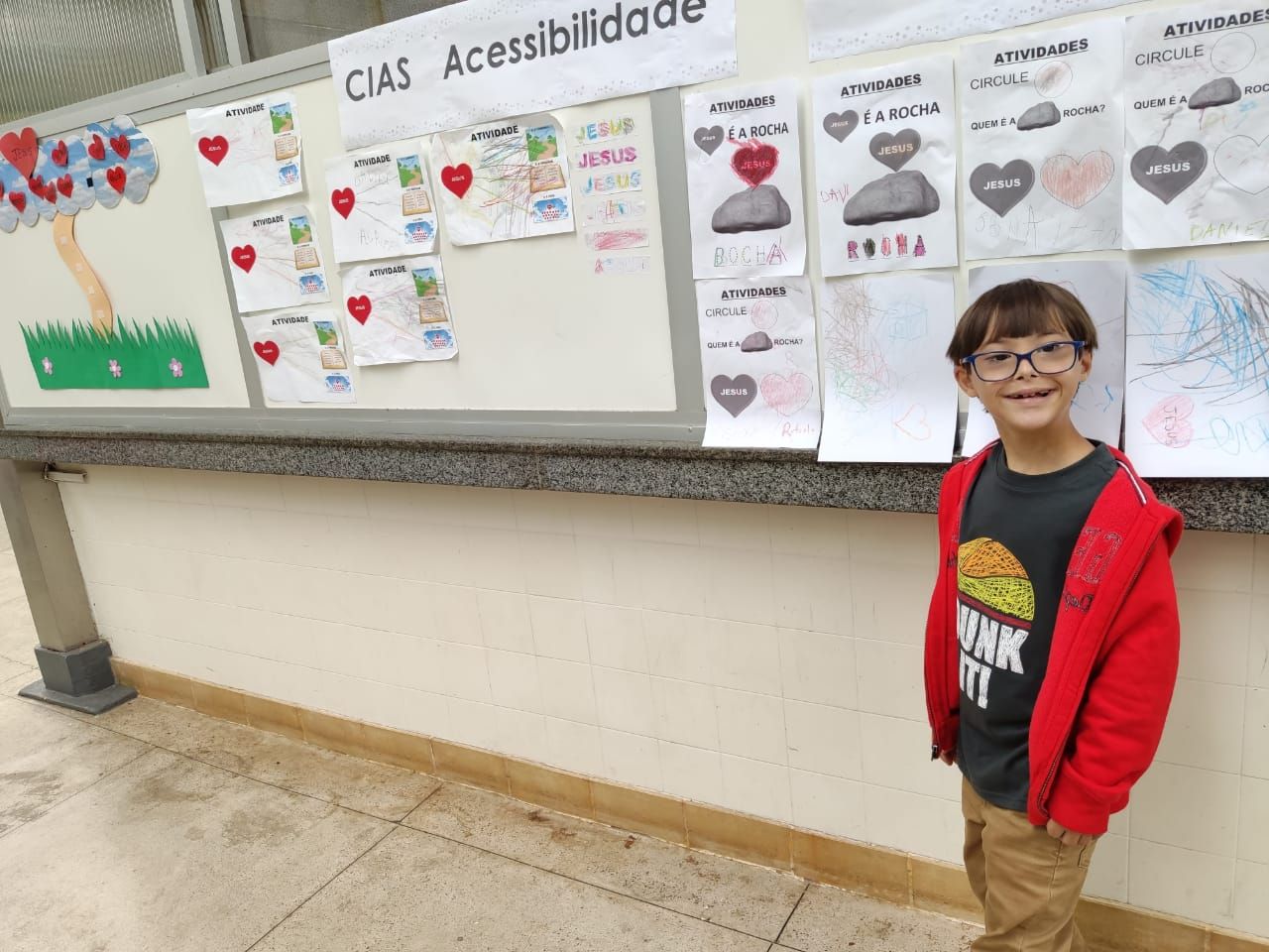 O pequeno Davi de Lima Griffo, 10 anos, durante o Encontro Unidos em Família, em dezembro de 2019, quando foi feito um projeto piloto de acessibilidade