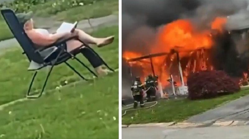 A mulher se sentou em frente a própria residência em chamas e assistiu ao incêndio lendo um livro (Foto: Reprodução)