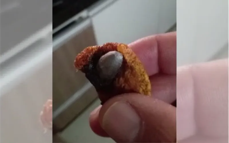 Imagem ilustrativa da imagem Homem encontra bala de arma de fogo em torresmo