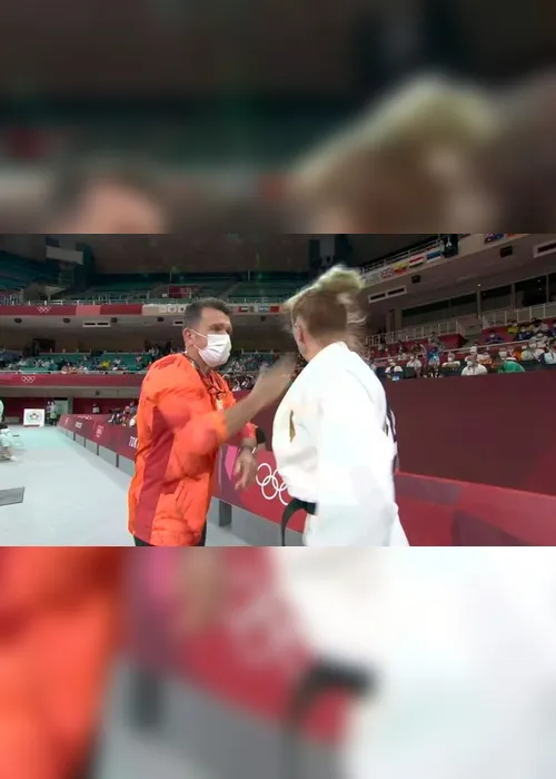 Imagem ilustrativa da imagem Judoca leva tapas no rosto do técnico em "ritual" antes de luta