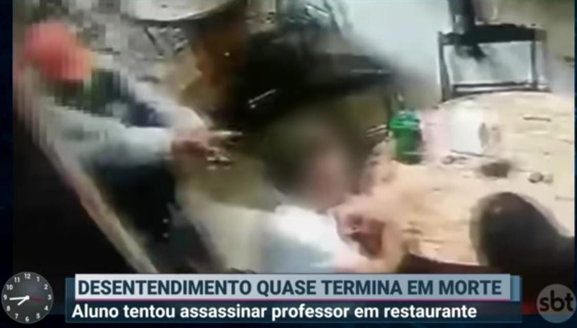 Aluno apertou o gatilho da arma por três vezes, mas arma falhou (Foto: Reprodução SBT)